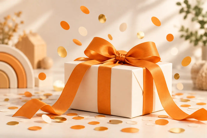 BabyLions® Gewinnspiel und Aktionen – Geschenk mit orangener Schleife und Konfetti
