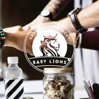 Teamwork und Gemeinschaft als Symbol für Vertrauen und Zusammenarbeit bei BabyLions
