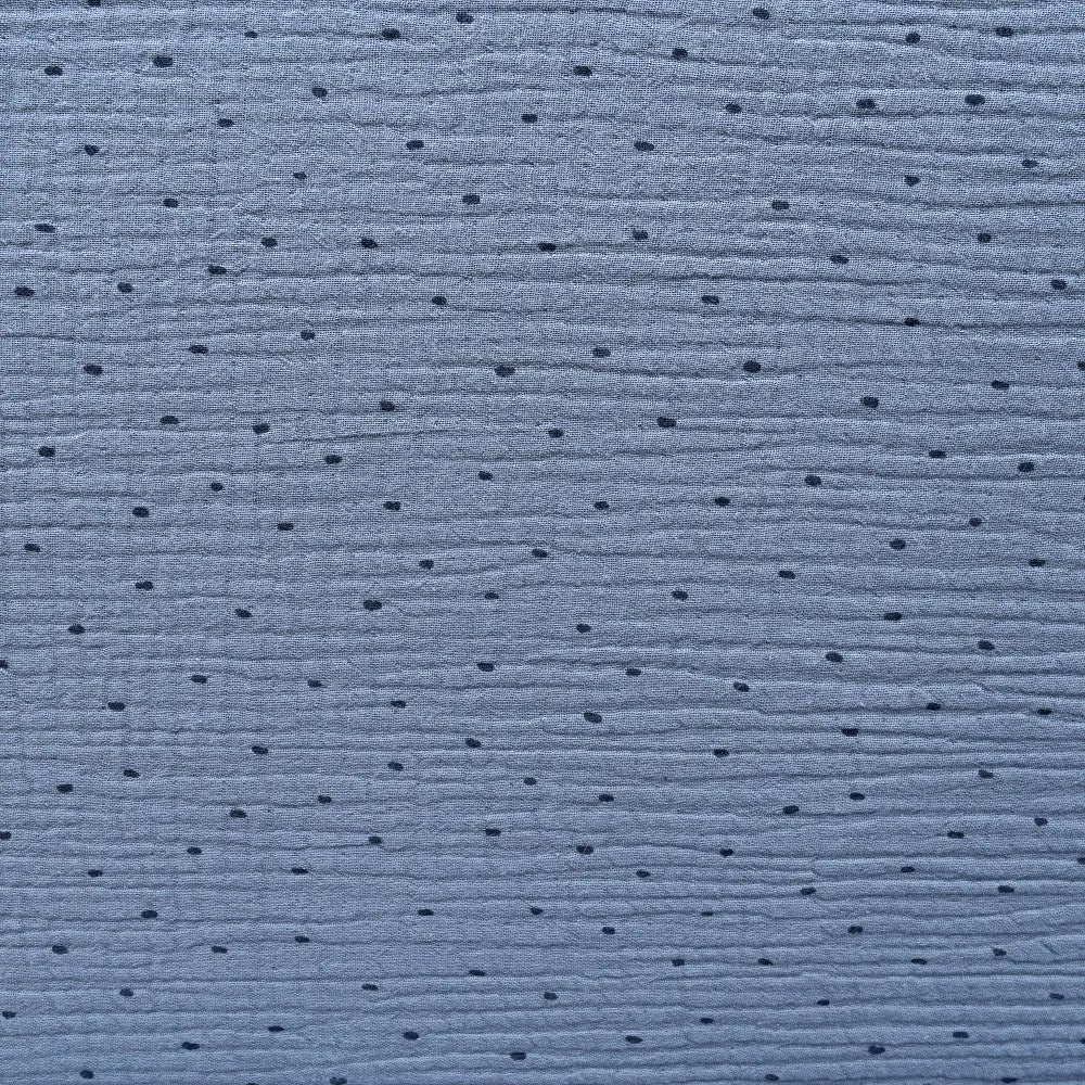 Detailansicht der blauen faltbaren Wickelunterlage mit dezentem Punktmuster