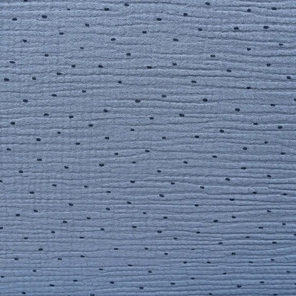Detailansicht der blauen faltbaren Wickelunterlage mit dezentem Punktmuster
