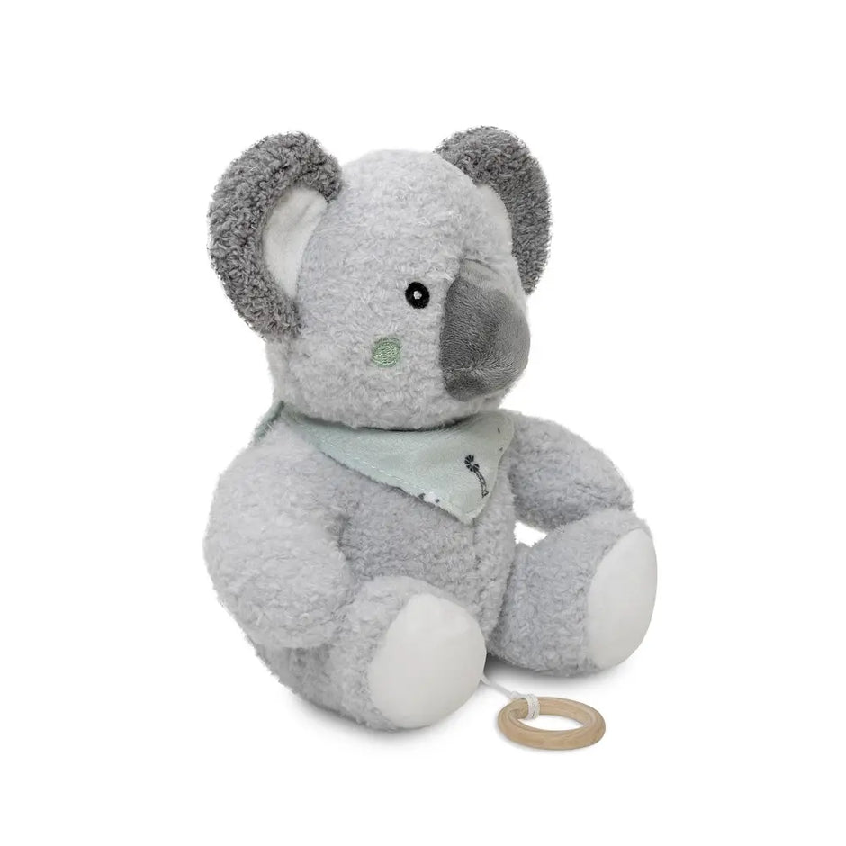 Koala Kuscheltier aus weichem grauem Plüsch mit Halstuch und Spieluhr-Zugring in seitlicher Ansicht