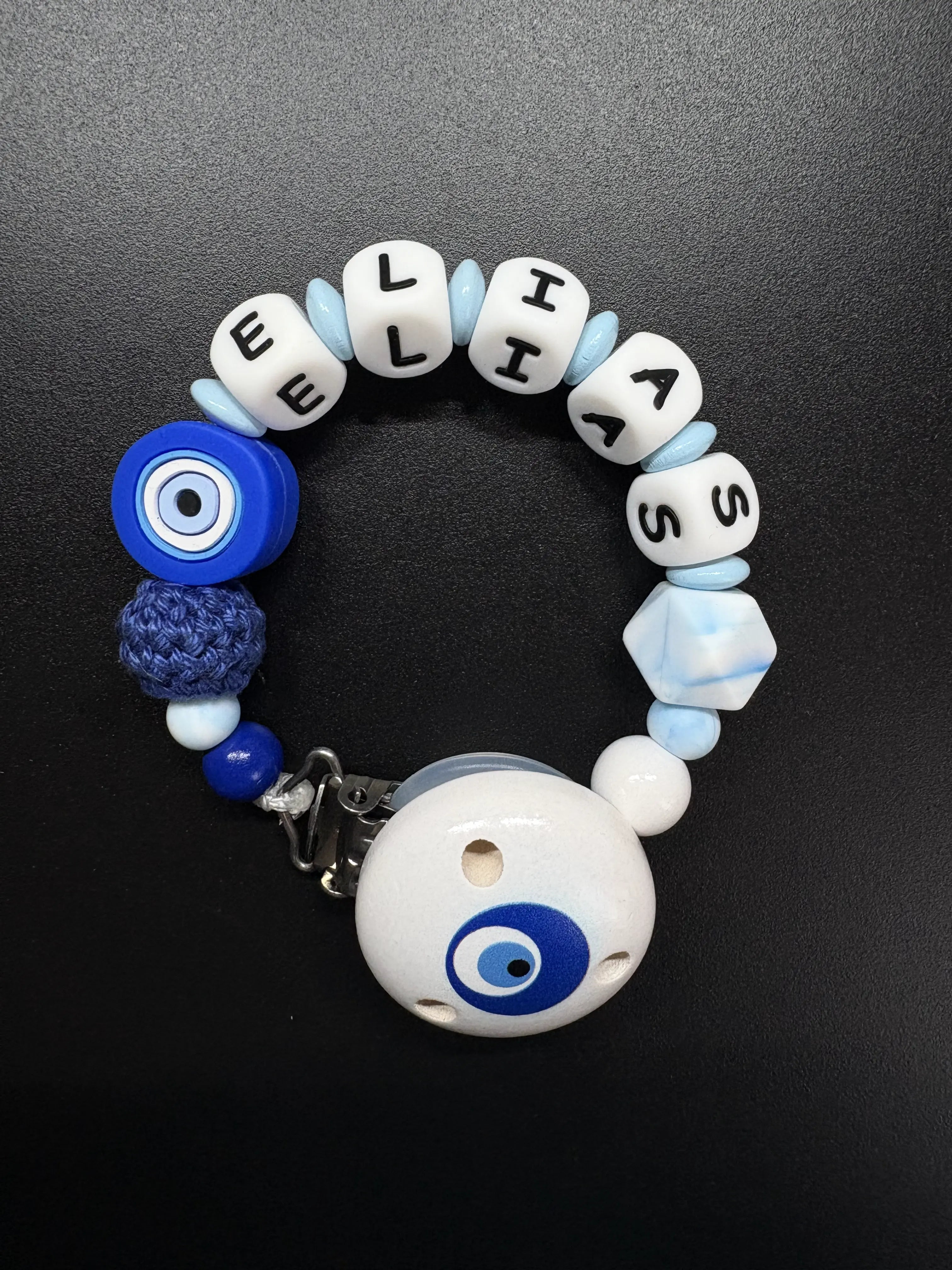 Personalisierte Schnullerkette mit Bösem Auge und Namen Elias in Blau Weiß