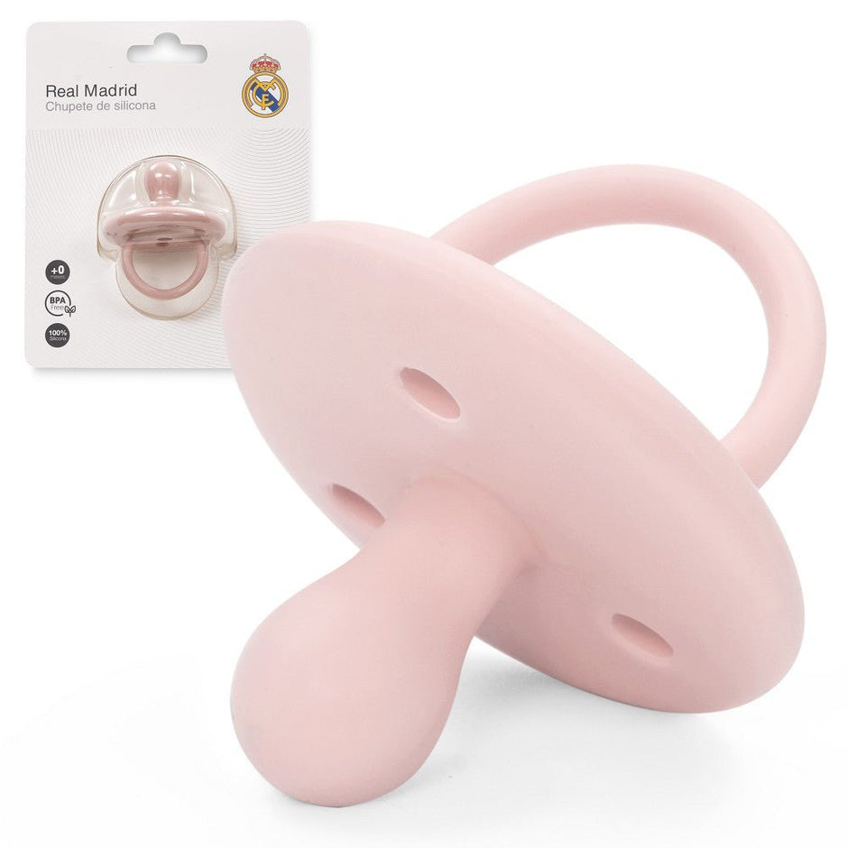 Real Madrid Schnuller aus Silikon rosa mit Verpackung im Hintergrund