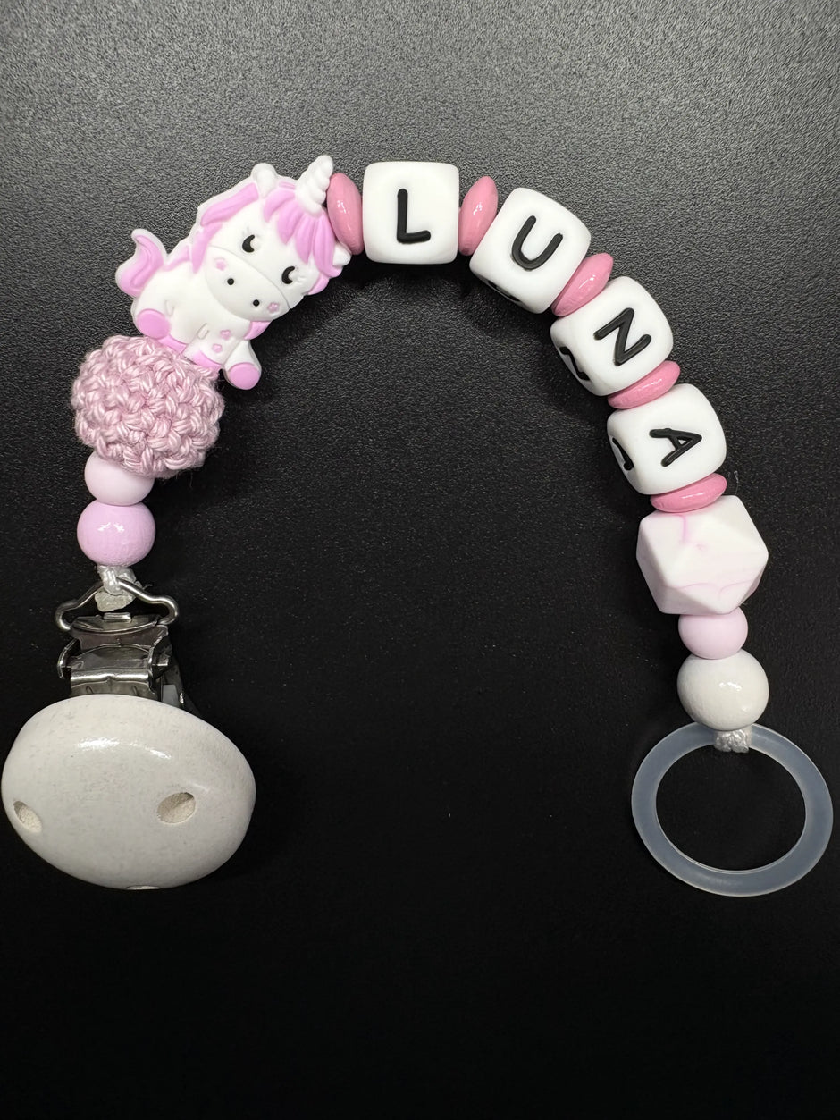 Personalisierte Schnullerkette mit Einhorn Motiv in Rosa und Weiß mit dem Namen Luna